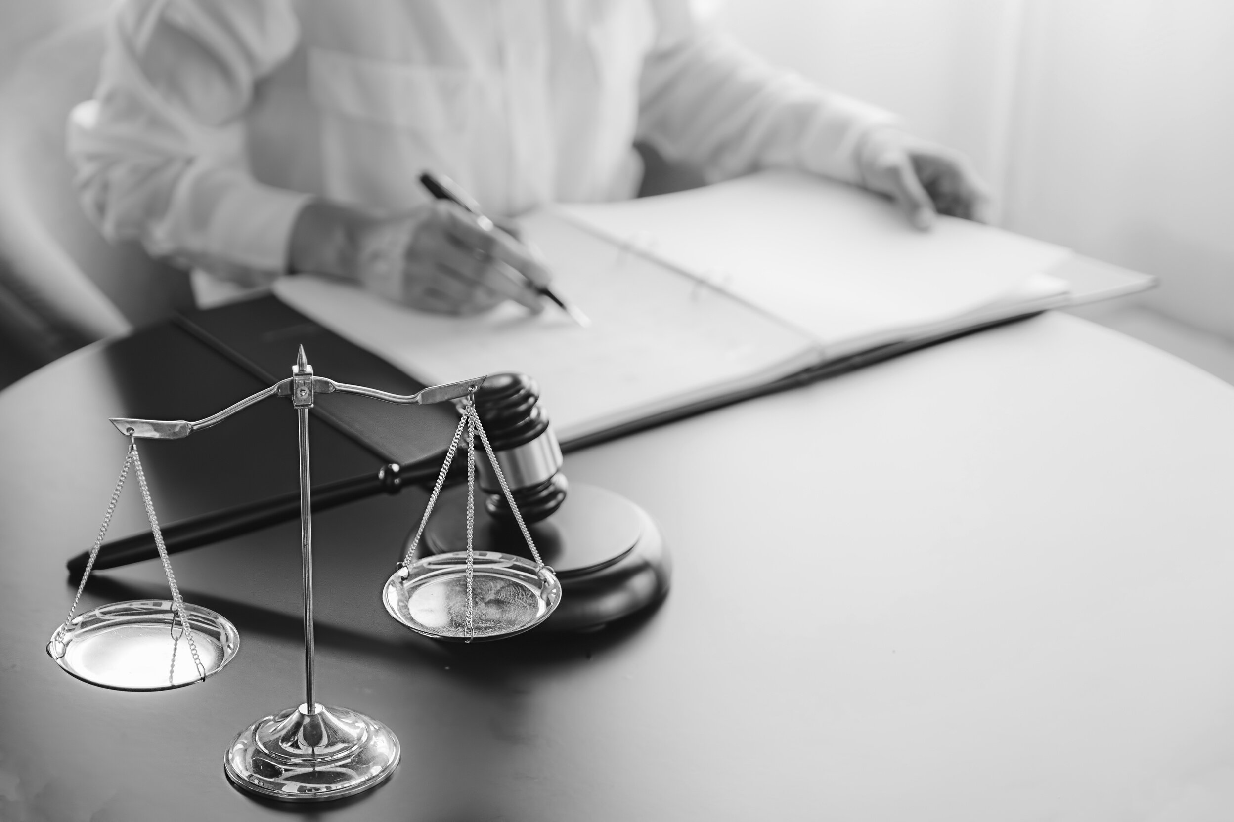 Judge Gavel with Justice Lawyers Having Team Meeting at Law Firm